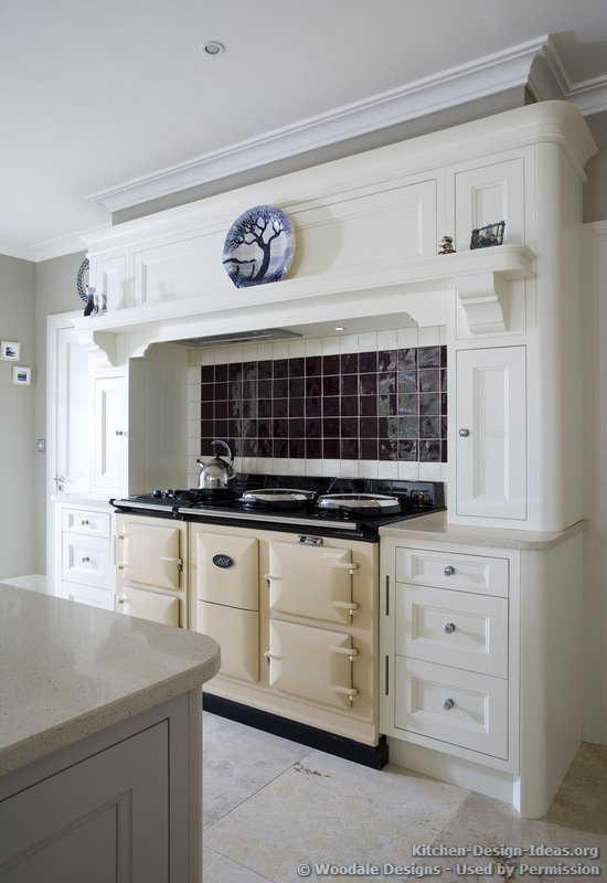 This cream-colored AGA range adds class to this vintage white kitchen