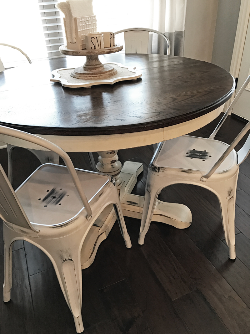 The perfect farmhouse dining room decor with metal white wash chairs