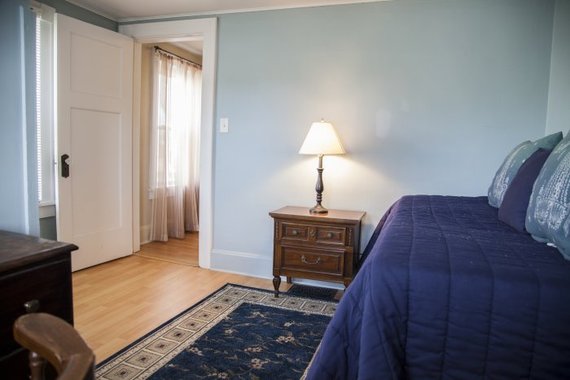 a blue-walled bedroom