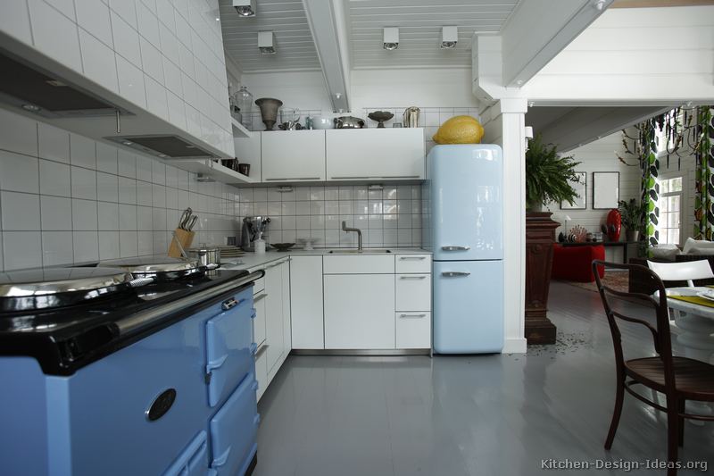 A blue retro-style refrigerator and AGA stove add a classic feel to this kitchen