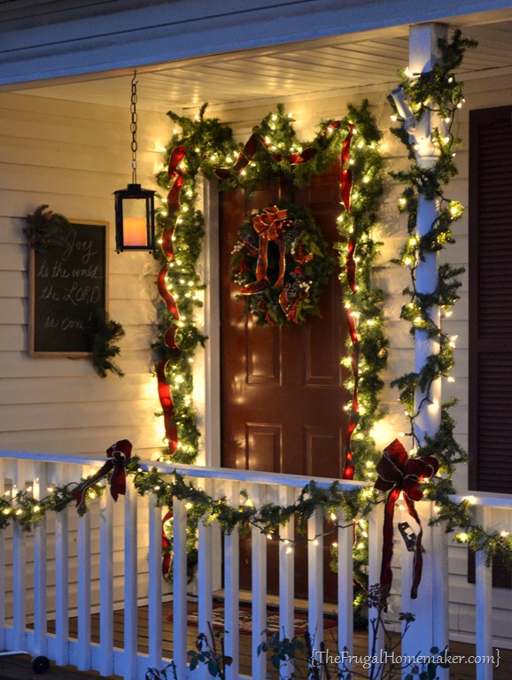 Christmas Front Porch with Hanging Candle Lanterns. 