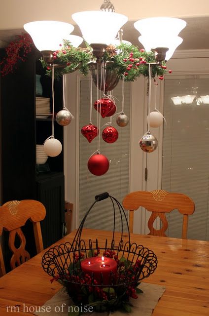 Hanging ornaments from the chandelier