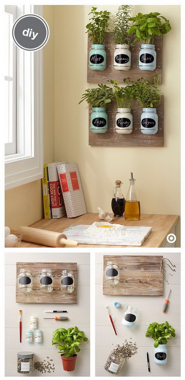 DIY Indoor Mason Jar Herb Garden. These DIY mason jar herb gardens are the perfect addition toany kitchen.  What you need: Wooden Plaque with Mason Jars, Hand Made Modern Paint, paintbrush, screwdriver, soil, herbs and a chalkboard marker.