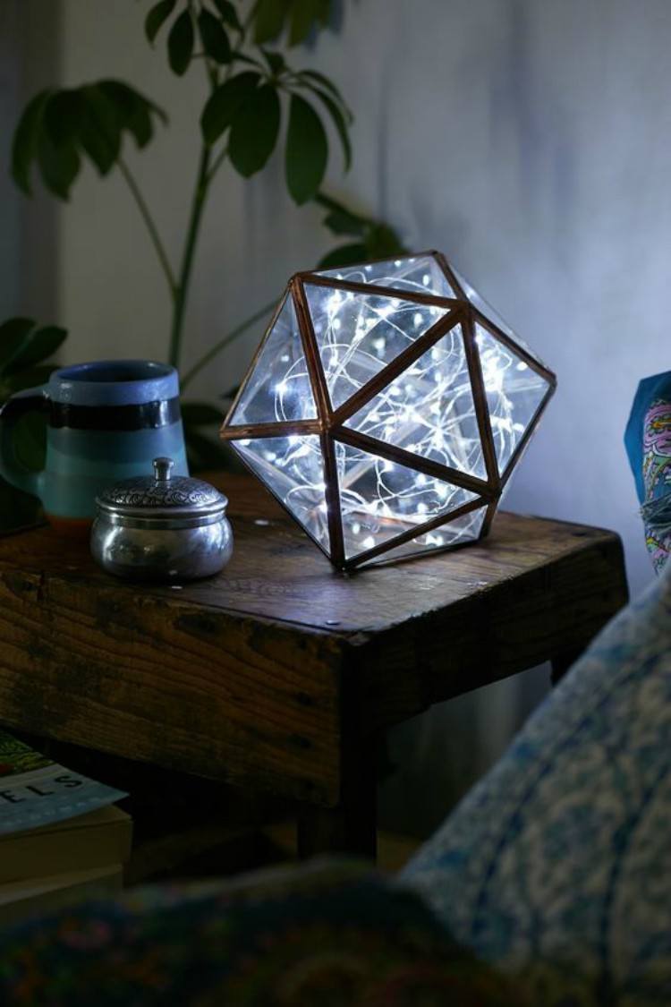 Lantern with fairy lights inside.