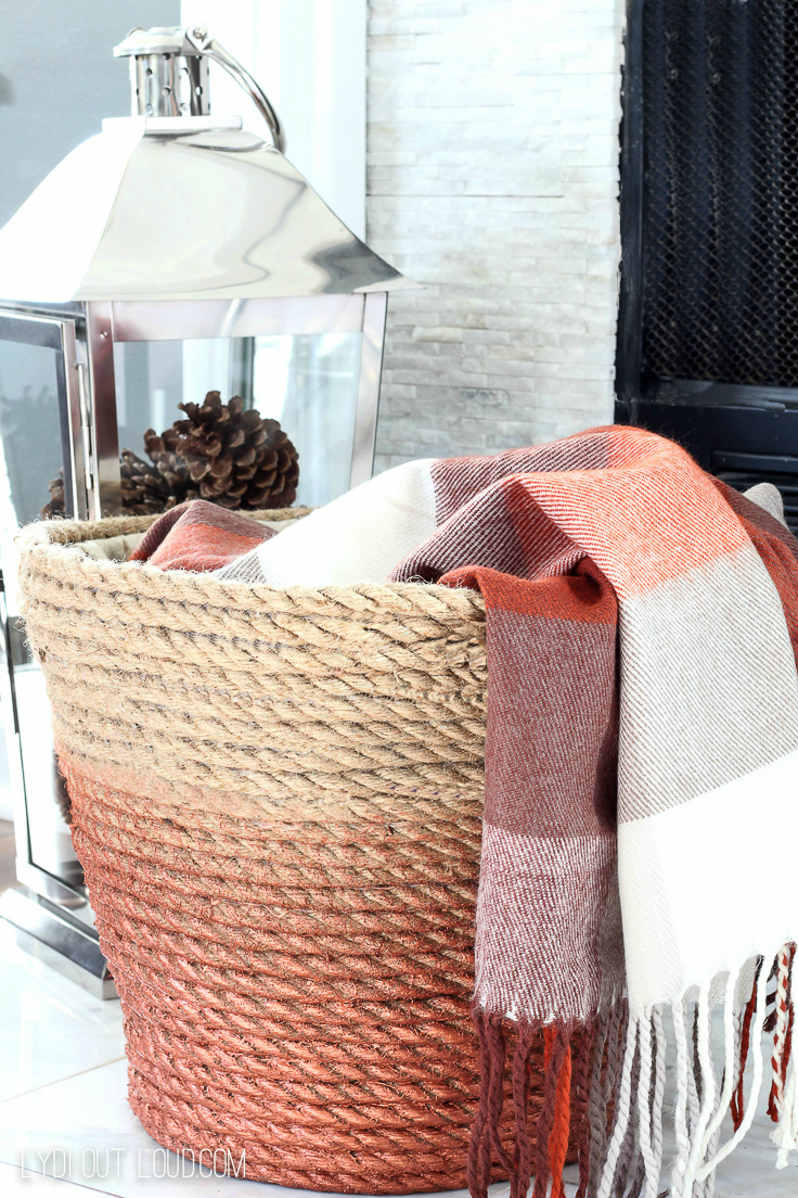 I'm obsessed with this DIY Metallic Rope Basket - so perfect to drape throw blankets in!